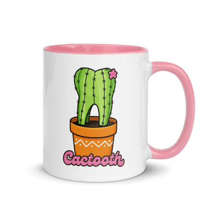 Weiße Keramiktasse mit pinkem Henkel und Innenseite sowie süßem Kaktus-Zahn-Motiv und Schriftzug „Cactooth“ – humorvolle Dental-Tasse für Zahnmedizin und Pflanzenfans