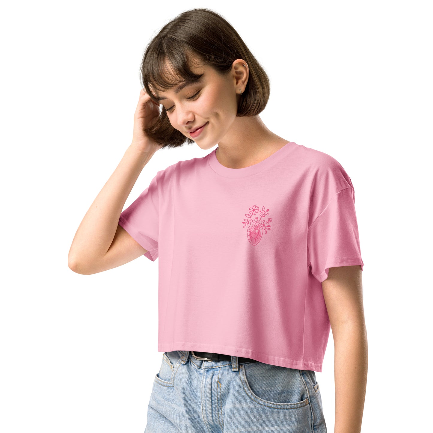 Locker geschnittenes Crop-Top „Bone Amour“ mit floralem anatomischem Herzmotiv auf der Vorderseite und Bone-Amour-Logo auf der Rückseite – medizinisch inspirierter Fashion-Look in Schwarz, Bubblegum Pink und Orchidee